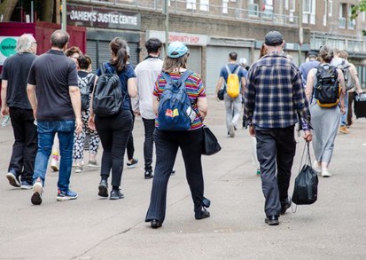 Group of people walking on a tour.