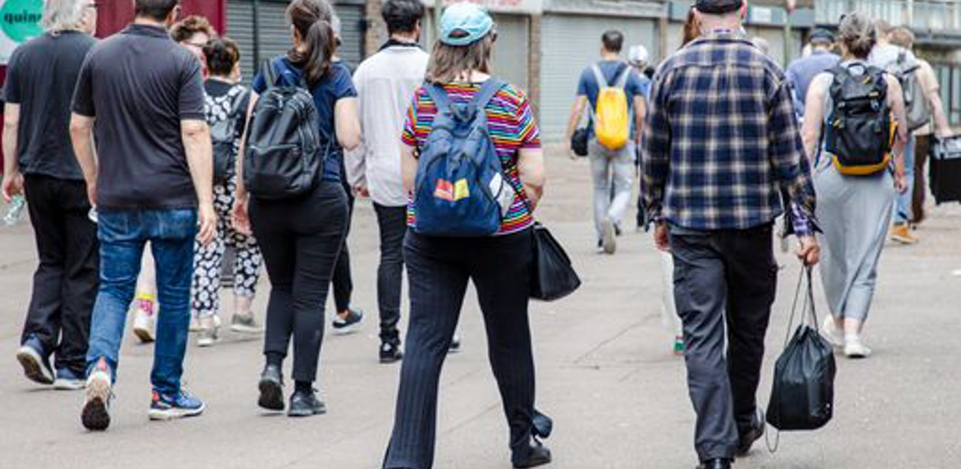 Group of people walking on a tour.