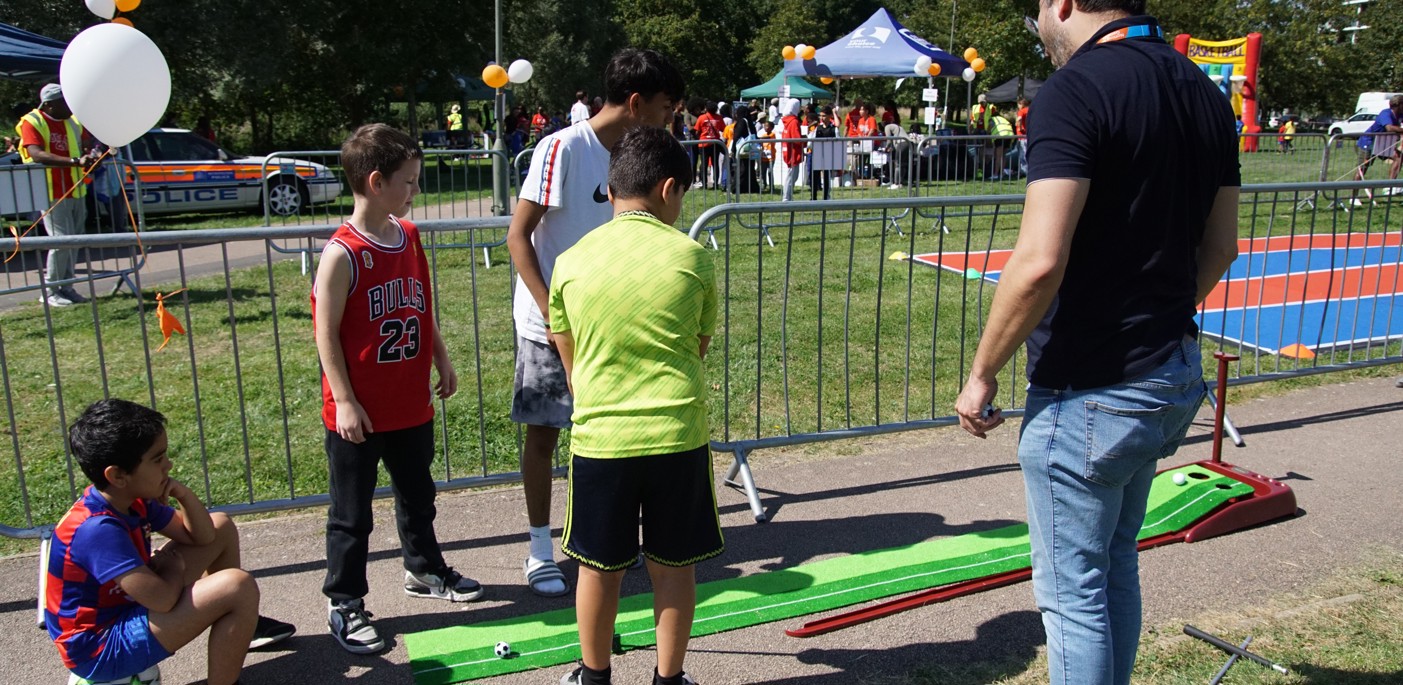 Young people enjoying sporting activities outside.