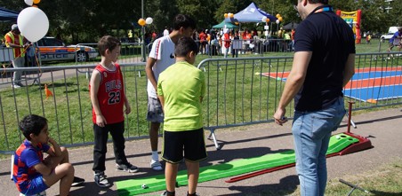 Young people enjoying sporting activities outside.