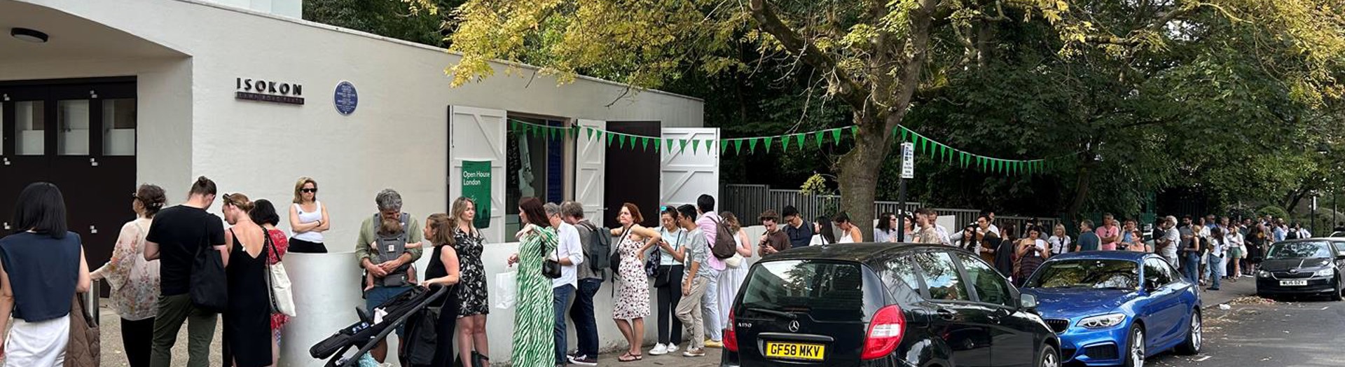 People queue to visit the building
