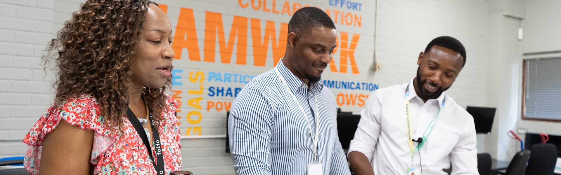 Housing colleagues working on their laptops.
