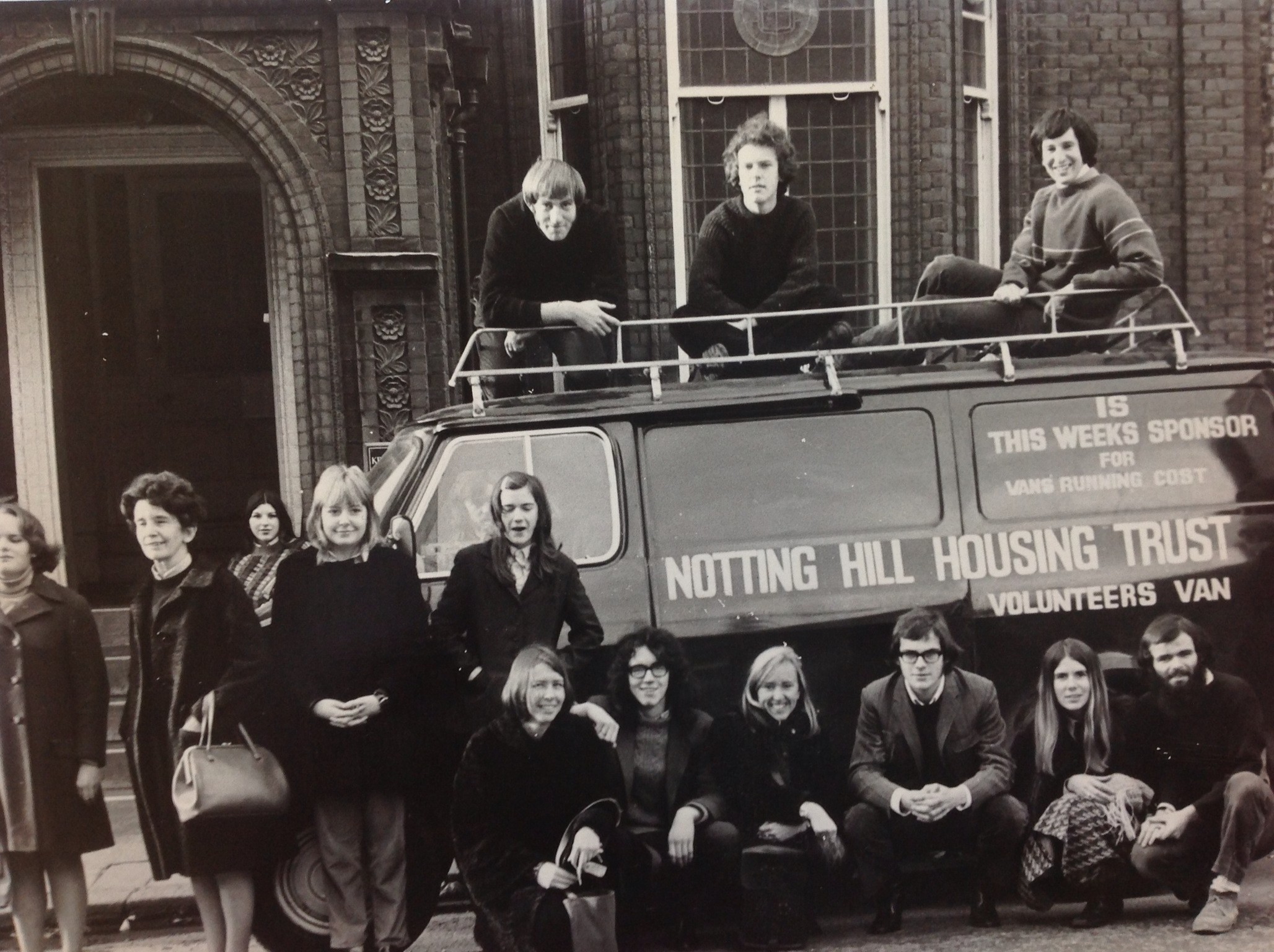 Early volunteers posing with the new volunteer van