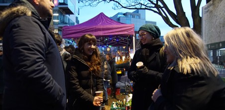 People enjoying festive celebrations on the street
