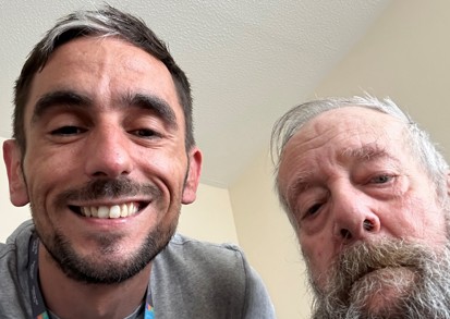 A housing officer and a resident he helped overcome hoarding