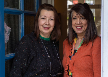 Two housing colleagues in a resident's home.