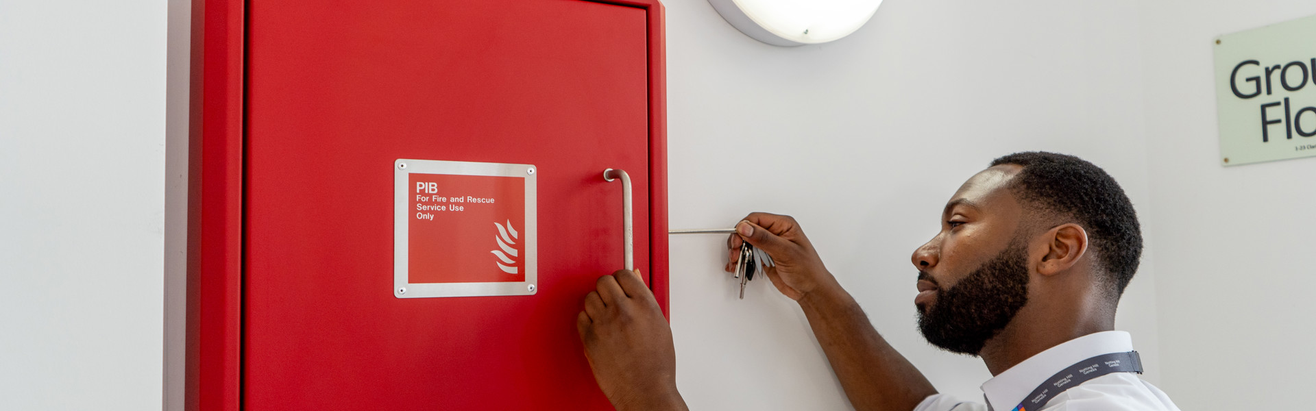 A housing officer doing maintenance checks. 